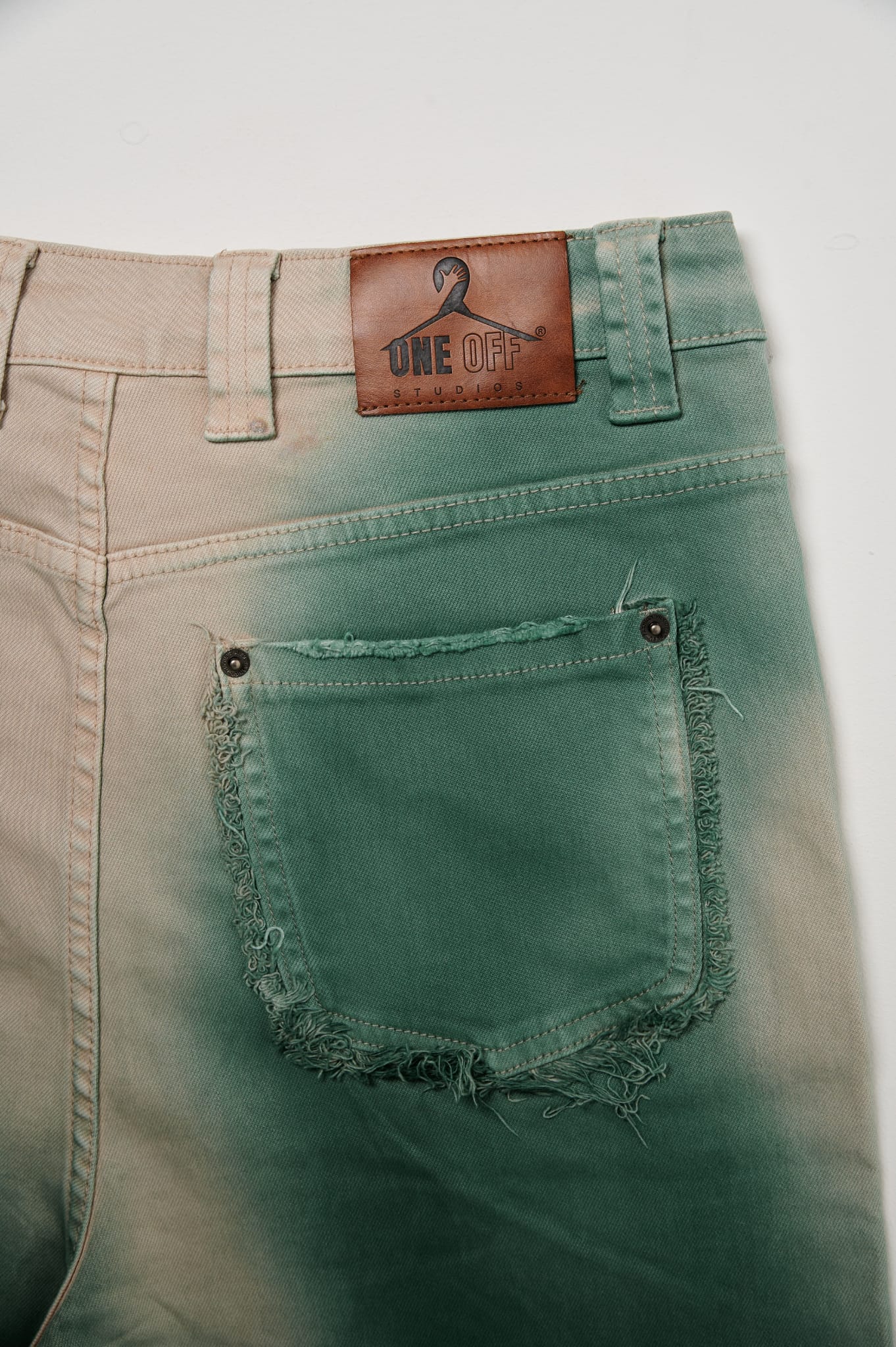 SPRAY WASHED DENIM ( CAMO GREEN)